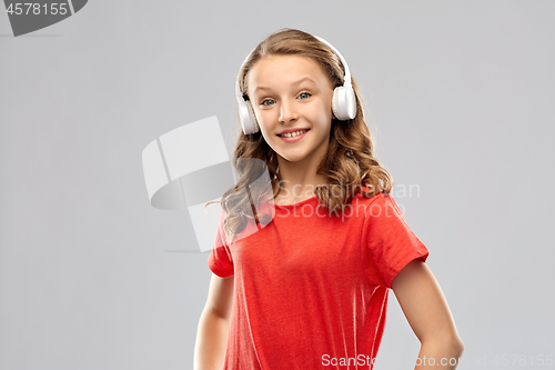 Image of happy teenage girl with headphones