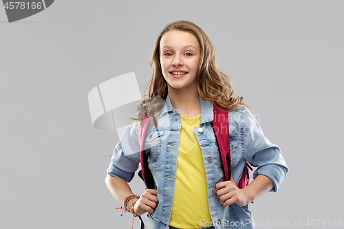 Image of happy smiling teenage student girl with school bag