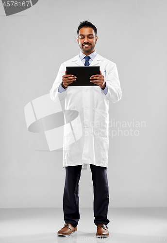 Image of indian doctor or scientist with tablet computer