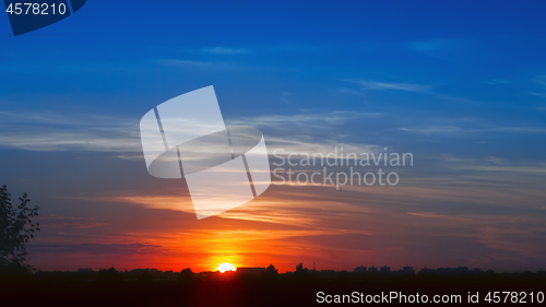 Image of Glowing Golden Sunset Sky Background