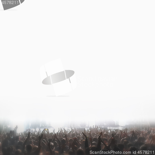 Image of Crowd With Hands Up At A Live Music Show