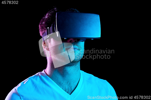 Image of man in virtual reality headset or vr glasses