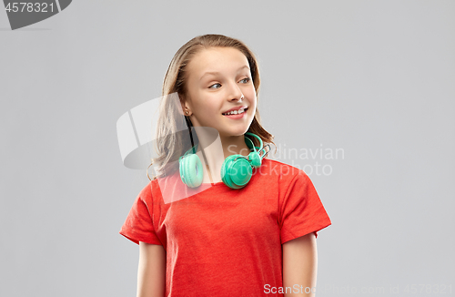 Image of happy teenage girl with headphones