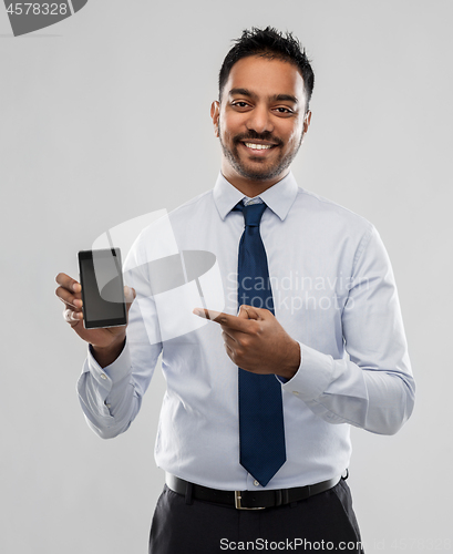 Image of indian businessman with smartphone