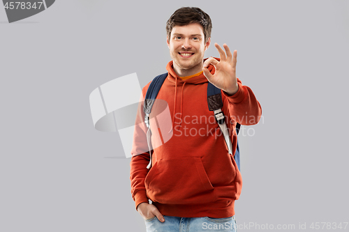 Image of young man or student with school bag or backpack