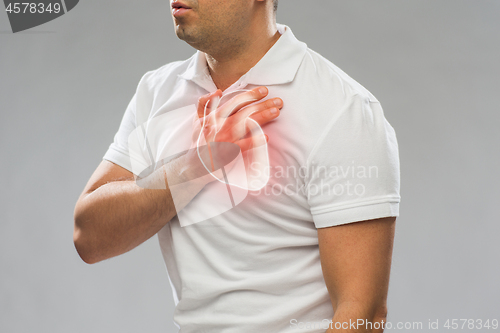 Image of close up of man having heart attack or heartache