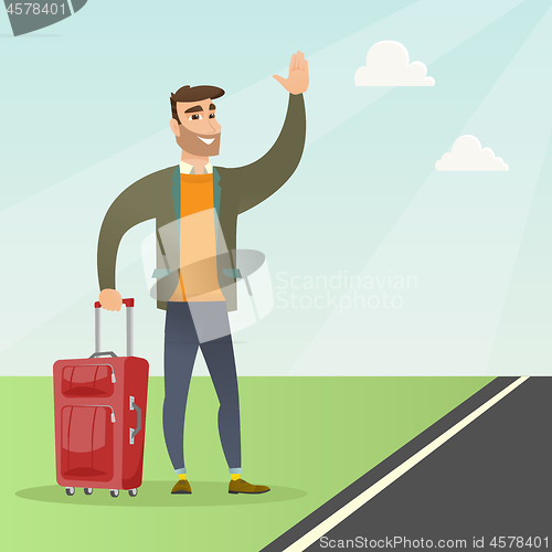 Image of Young caucasian man with suitcase hitchhiking.