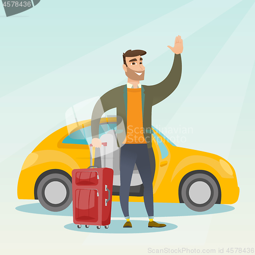 Image of Young caucasian man waving in front of car.