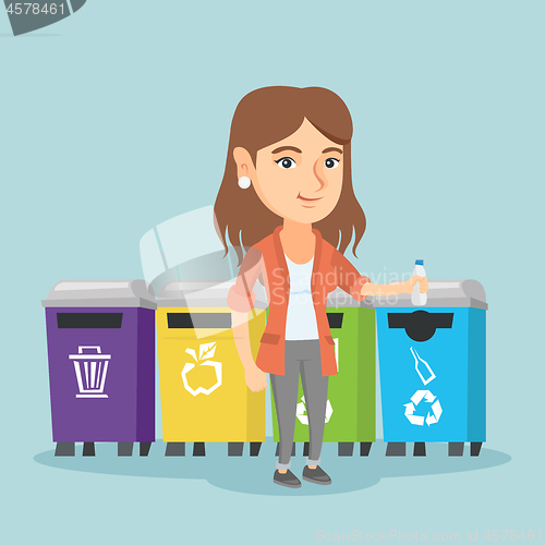 Image of Young caucasian woman throwing out plastic bottle.