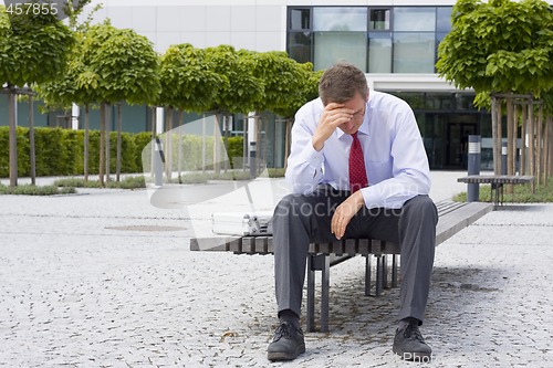 Image of Stressed businessman