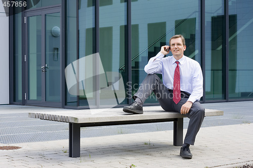 Image of Businessman making a phone call