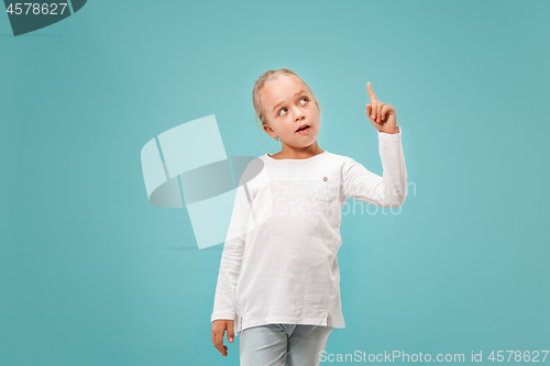 Image of Young serious thoughtful teen girl. Doubt concept.