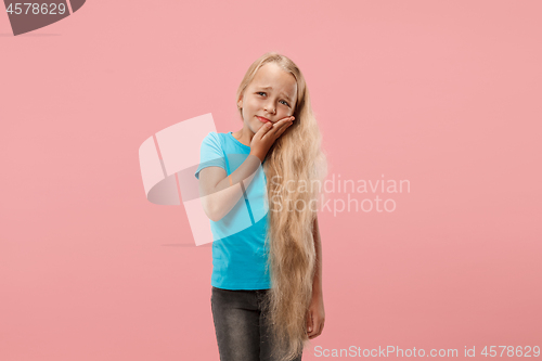 Image of Young girl is having toothache.