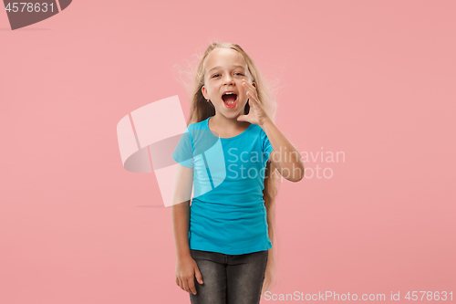 Image of Isolated on pink young casual teen girl shouting at studio