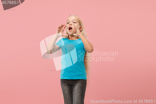 Image of Isolated on pink young casual teen girl shouting at studio