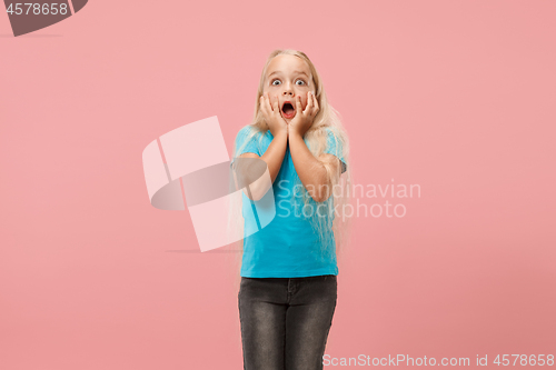 Image of Portrait of the scared girl on pink