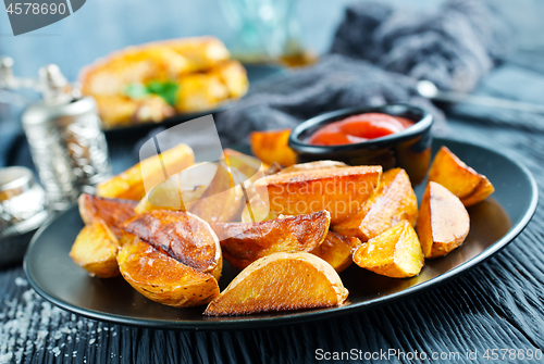 Image of potato with chicken wings