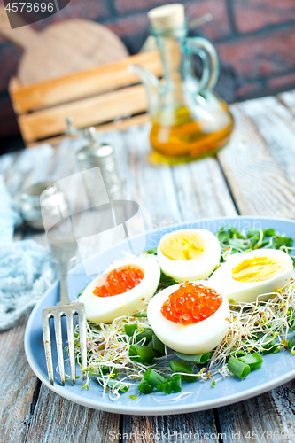 Image of eggs with red salmon caviar