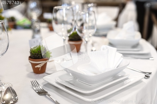 Image of Plates and dishes on dining table