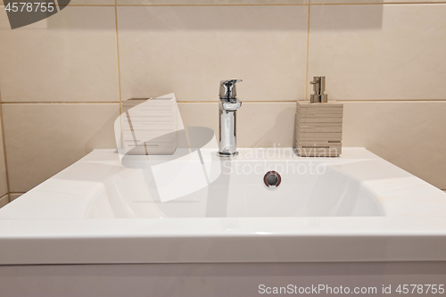 Image of Bathroom interior with sink and faucet