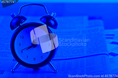 Image of Time is money. Business concept. Blue toned.