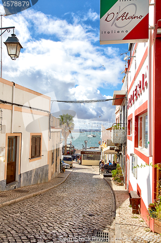 Image of Beautiful narrow street of potuguese fisherman village Alvor in 