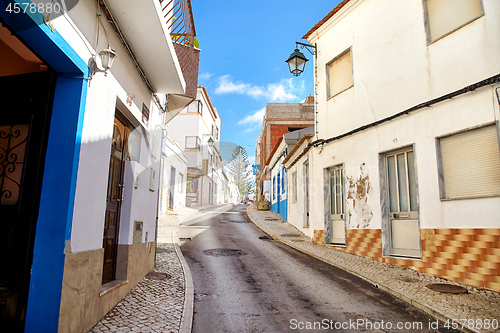 Image of Beautiful narrow street of potuguese fisherman village Alvor in 