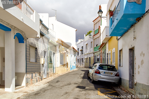 Image of Beautiful narrow street of potuguese fisherman village Alvor in 