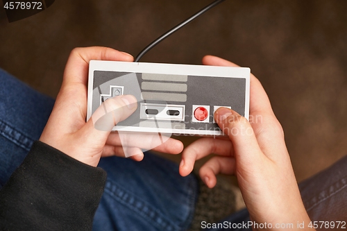 Image of Playing an old gaming console