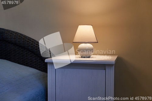 Image of Lamp on a nightstand