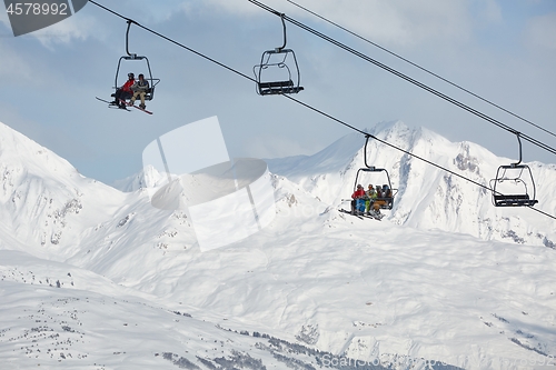 Image of Skiing slopes, with many people