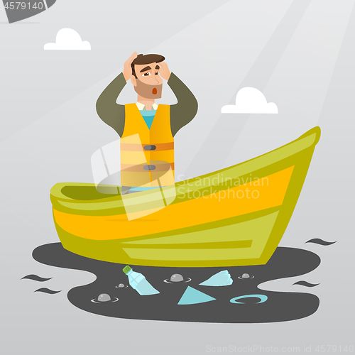 Image of Man floating in a boat in polluted water.