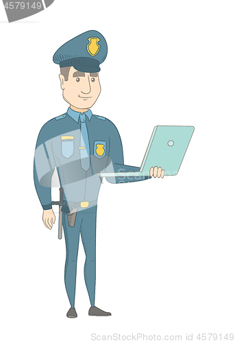 Image of Young caucasian policeman using a laptop.