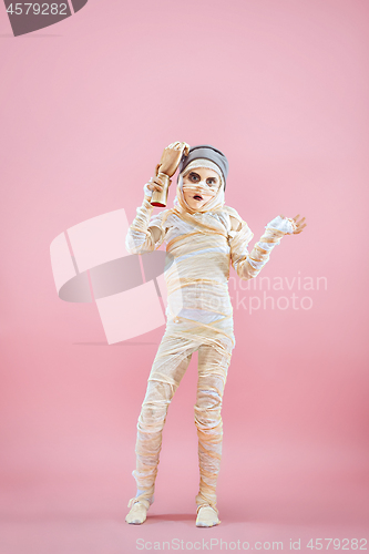 Image of Studio image of a young teen girl man bandaged,