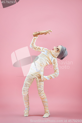 Image of Studio image of a young teen girl man bandaged,