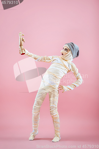 Image of Studio image of a young teen girl man bandaged,