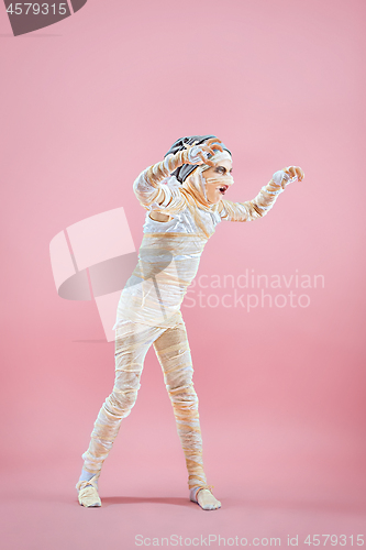 Image of Studio image of a young teen girl man bandaged,