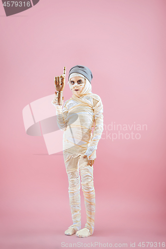 Image of Studio image of a young teen girl man bandaged,