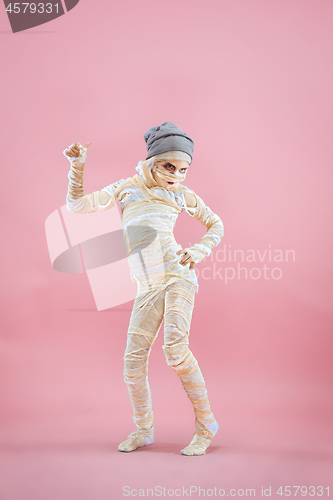 Image of Studio image of a young teen girl man bandaged,