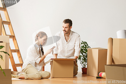 Image of Couple moving to a new home.