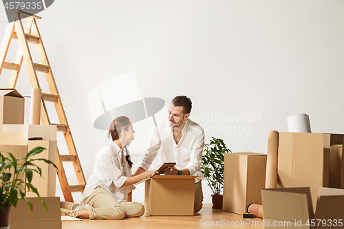 Image of Couple moving to a new home.