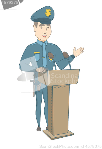 Image of Young policeman giving a speech from the tribune.