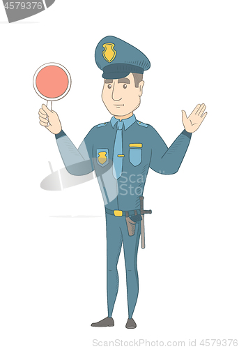 Image of Caucasian traffic policeman holding traffic sign.