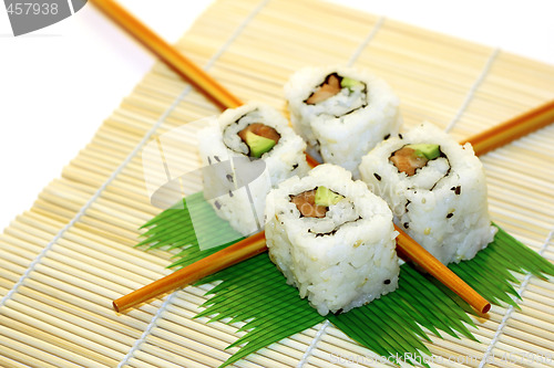 Image of Sushi Rolls structured over white