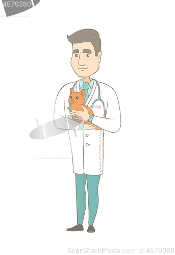 Image of Young caucasian veterinarian with cat in hands.