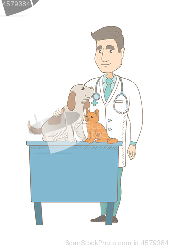 Image of Young caucasian veterinarian examining pets.