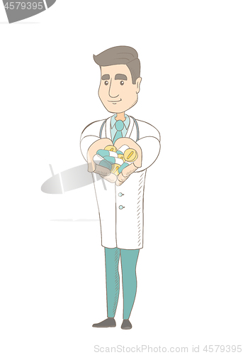 Image of Young caucasian pharmacist giving pills.