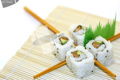 Image of Sushi Rolls structured over white