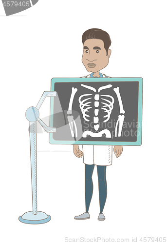 Image of Hispanic roentgenologist during x ray procedure.