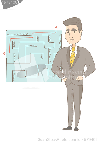 Image of Businessman looking at labyrinth with solution.